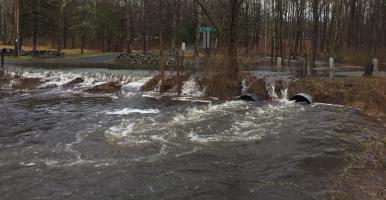 flooding from undersized road/stream crossing during storm
